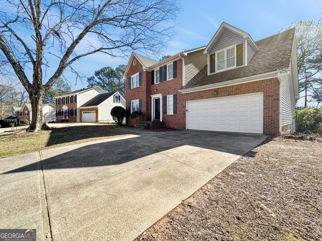 Photo of 1890 Tree Brooke Lane, Snellville, GA 30078 (MLS # 10690519)