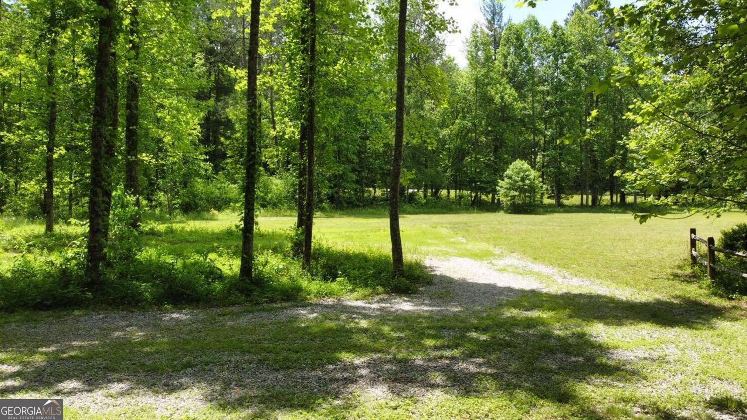 Two outstanding creekside lots 2.5+/-acres each or 5 acres with both parcels. The entire property line is bordered by beautiful Watts Creek. Parcel #1 includes a "horse shoe bend" in the creek, which creates an Island picnic area. All four sides of both parcels are protected from development due to their location to the creek. Both properties have protection restrictions to assure the parcels remain in their natural partially cleared and wooded surroundings. Both properties are accessed right on Timber Ridge Road, a paved country road with no homes on the entire track. The property has been recently perked and both lots have city water access and power on the street. Tract#1 East side 2.5 +/- acres listing price is $289k - Tract#2 West side 2.5+/- acres listing price is $249k Both Tracts (parcels) 5 +/- acres available for $459k