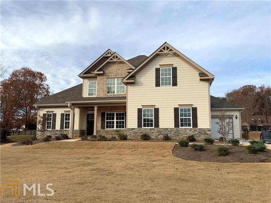 Hard to find new construction in one of North Hall's prettiest neighborhoods with a community lake for walking/fishing. Stunning architectural detail-wrought iron railing on staircase, interior columns and coffered ceiling in dining room. Beautiful island kitchen and open floor plan opens to a covered rear porch great for entertaining or relaxing.  Huge bonus room upstairs is great for storage and/or work from home.  With fiber optic for internet, you won't find faster speeds on downloads and streaming.Private cul-de-sac street; convenient to 985, Gainesville & Cornelia