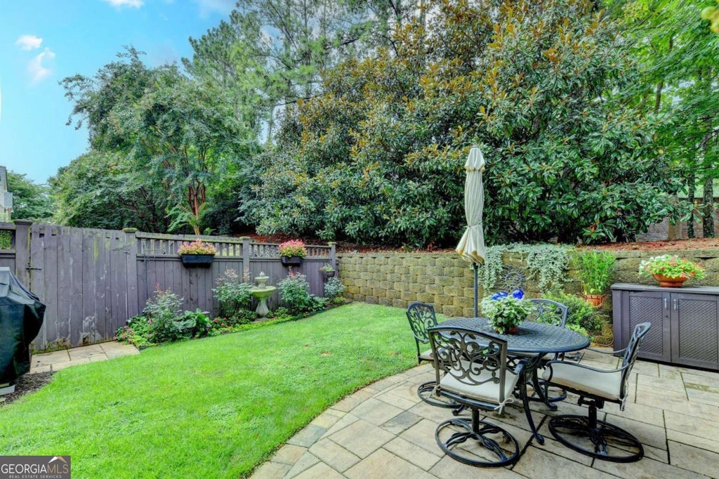 Photo of 7456 Portbury Park Lane, Suwanee, GA 30024 (MLS # 10823862)