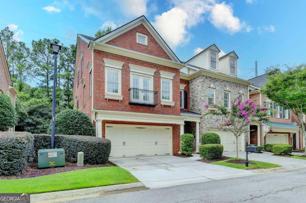 Photo of 7456 Portbury Park Lane, Suwanee, GA 30024 (MLS # 10823862)