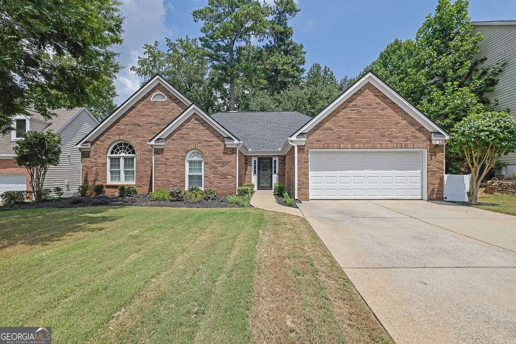 AMAZING OPPORTUNITY - COMPLETELY RENOVATED RANCH HOME!Don't miss this amazing one-level home featuring an open, light-filled floor plan with vaulted ceilings and custom finishes throughout. Enjoy a brand-new chef's kitchen with granite countertops, large island, stainless steel appliances, and designer fixtures. New flooring, fresh paint inside and out, and modern lighting elevate every space. The spacious master suite boasts tray ceilings, a spa-style bath, and double closets. Bonus room can be used as an office, nursery, or 4th bedroom. Both bathrooms are fully updated. Enjoy a private, level lot, new water heater, blinds throughout, and a flat driveway. Community pool & tennis, top-rated Kennesaw Mountain High School across the street, and minutes from I-75, Marietta, Acworth & Kennesaw. All big-ticket updates are done-just move in!