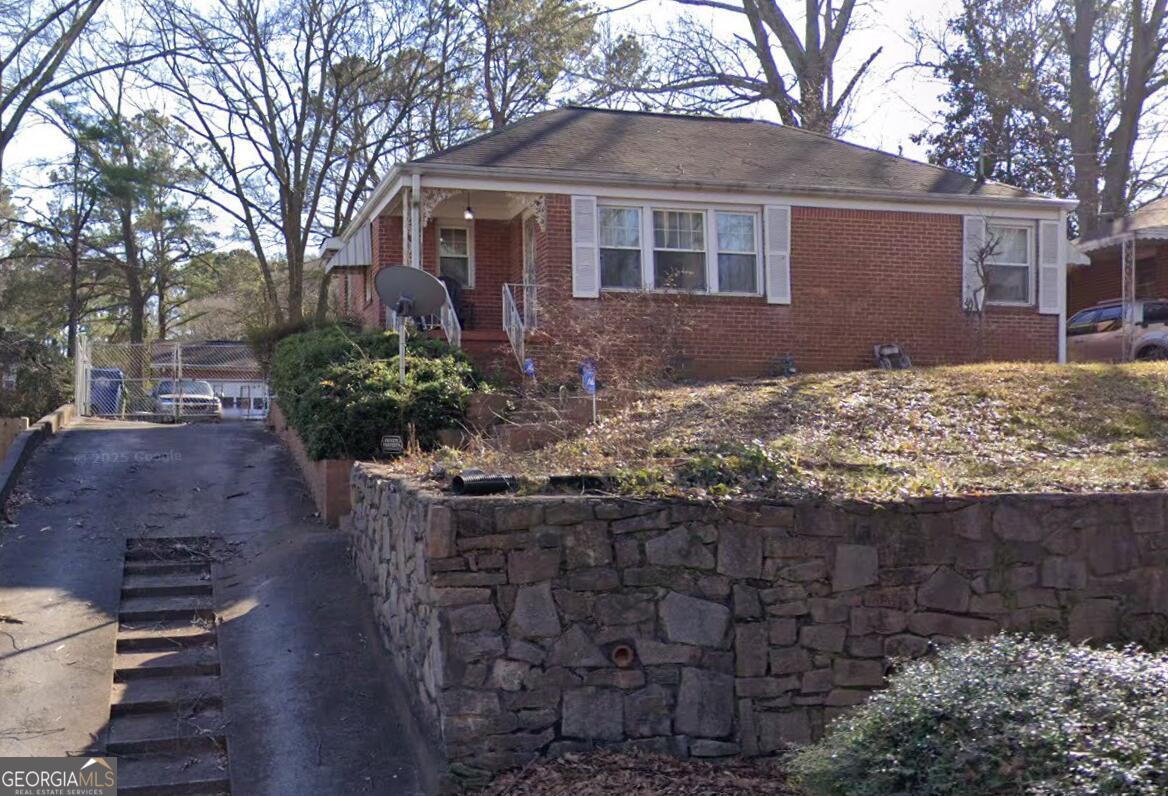 Welcome to this charming home located in the heart of Atlanta. This residence features a spacious layout with ample natural light throughout. Enjoy the convenience of a modern kitchen, complete with updated appliances and plenty of storage. The property includes a generous backyard, appropriate for outdoor activities. Situated in a vibrant neighborhood with easy access to local amenities and transportation. This home offers a wonderful opportunity for comfortable living in a prime location. Addiotionaly, the porperty has a detached 2 car garage