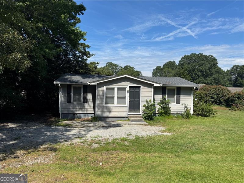 Unbeatable Location & Value in Atlanta - Just Minutes from the Airport! Welcome to this charming 3-bedroom, 1-bath home located less than 10 minutes from Hartsfield-Jackson Atlanta International Airport - perfect for frequent travelers or anyone seeking a quick commute into the city! Freshly painted and move-in ready, this home features a beautifully renovated kitchen with new vinyl flooring, plus original hardwoods throughout the rest of the living space. Enjoy your morning coffee on the back porch overlooking a private backyard with no neighbor on one side, plus a convenient storage shed for all your extra gear. Sitting on a .225-acre lot, this hidden gem offers rare privacy and unbeatable value. Homes like this under $150K in this area are nearly impossible to find- don't miss your chance!