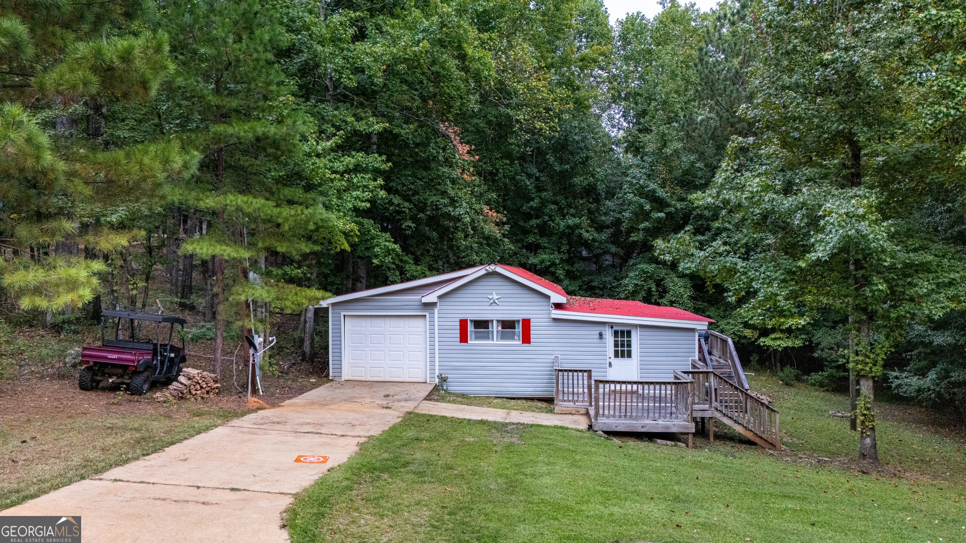 Well maintained mobile home just a short walk to nearby West Point Lake. Enjoy fishing, swimming, and boating on the shared commumity dock. Large den, deck, and private screen porch. Home is on a leased lot, yearly fee is $2600 this includes water from a community well. Great for a weekend home or as your permanent home.