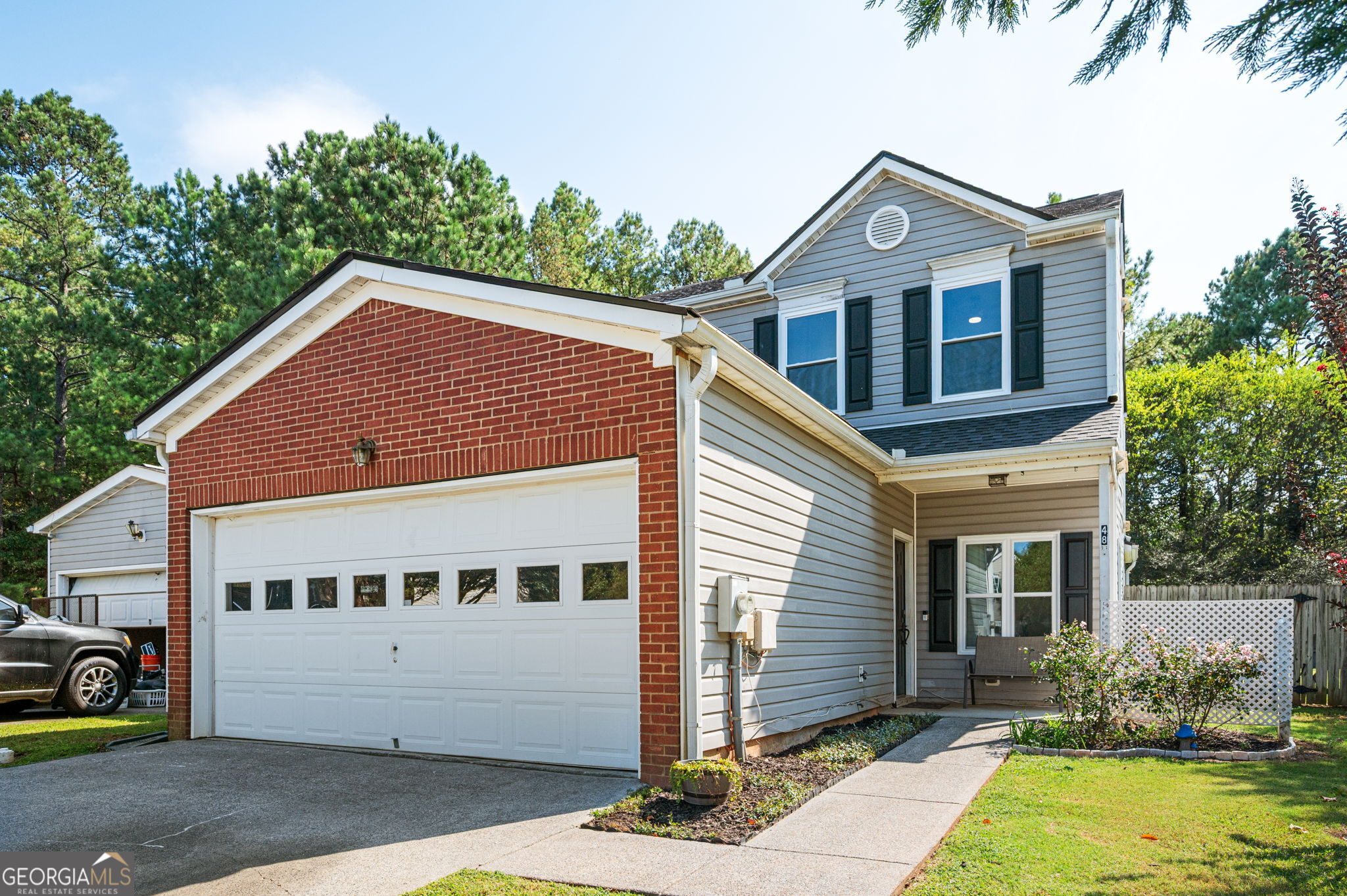 Incredible opportunity for a 4 bedroom townhome with the primary bedroom on main, on a cul-de-sac, with a large fenced yard, AND new windows, AND a new roof, AND, AND, AND! Step inside after a long day's work and flop on your couch in your two story living room which showcases a fireplace and open staircase. Too tired for stairs? The primary bedroom and bath are on the main level! Upstairs, you'll find three spacious bedrooms and one full bathroom. Grill dinner, toss a ball to your pup, or simply watch your birdfeeder in your private and fenced backyard. So rare to find a four bedroom townhome in this area! Sellers have invested in big projects to make this a solid home. 2025 Projects - New Roof, New Windows 2024 Projects - New AC unit, All kitchen appliances Replaced! New Insulation in attic, Kitchen sink Replaced!, All bathroom sinks and toilets Replaced! All kitchen appliances stay with the home! Excellent Community!