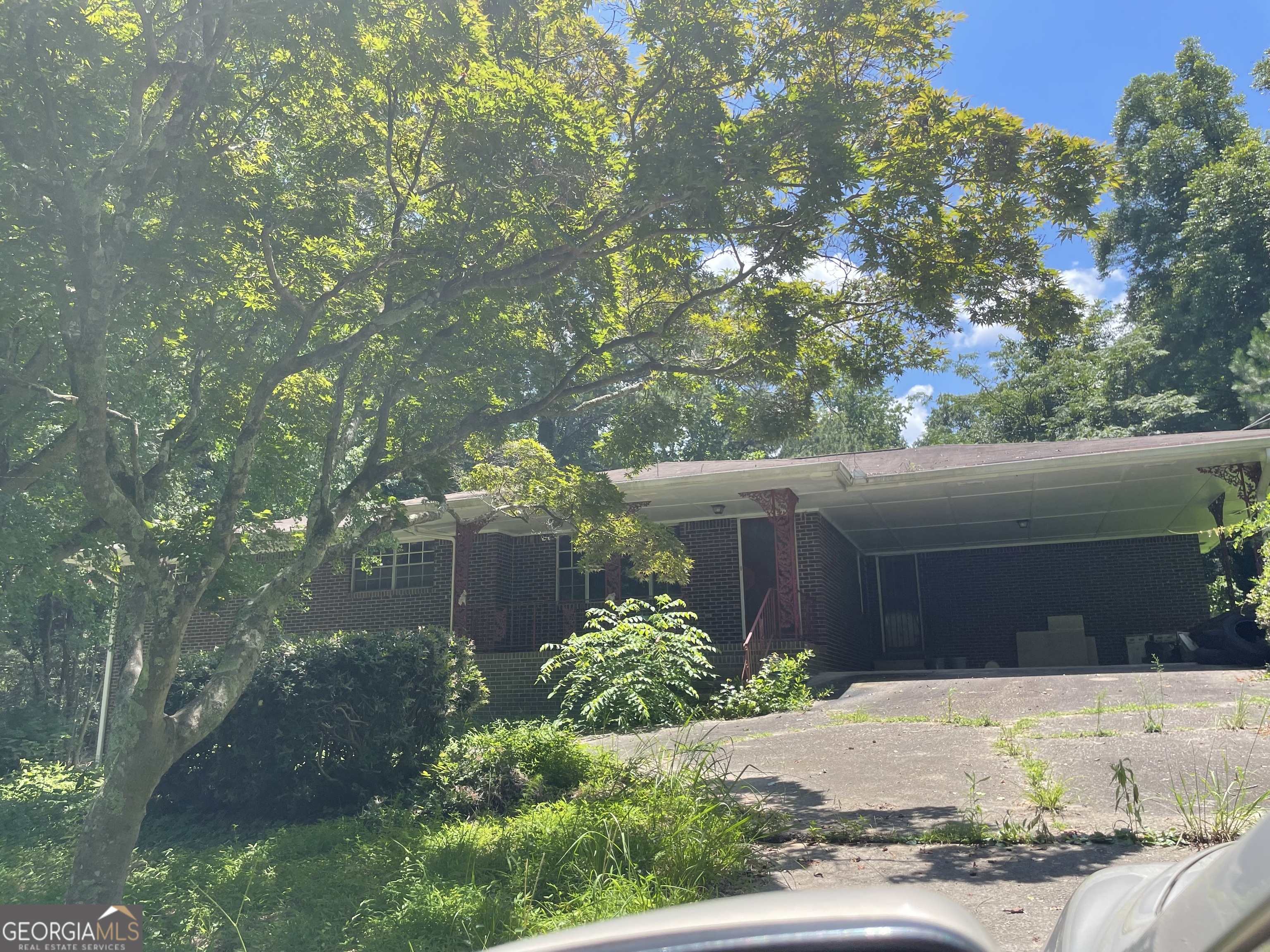 Solid brick ranch on a full basement. Ready for completion of renovations. Over 1 acre secluded urban homestead location. Make this three bedroom your family home or solid rental investment .