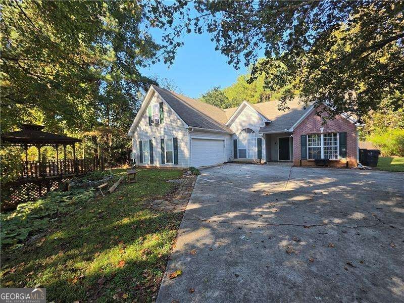 Photo of 945 Spring Ives Drive, Lawrenceville, GA 30043 (MLS # 10871764)