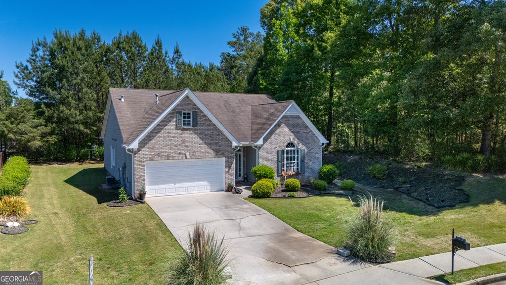 Photo of 5 Honeysuckle Lane, Fairburn, GA 30213 (MLS # 10793453)