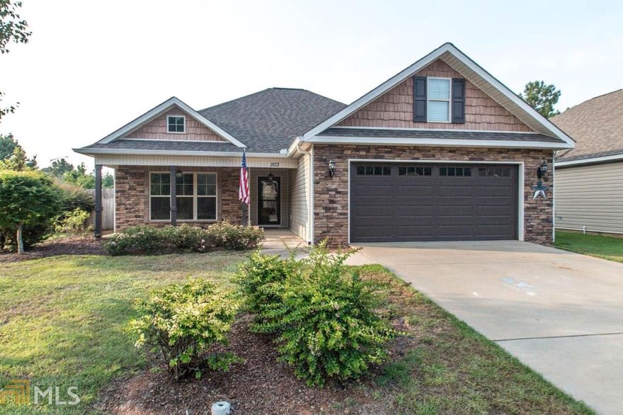 Welcome home! Don't miss out on this beautiful 3 bedroom, 2 bathroom home in the highly desired Wooden Eagle Plantation subdivision. This corner lot home features a spacious living room, gas log fireplace, coffered ceilings, an eat in kitchen, large walk in closet in master, a garden tub with a separate shower in the master bath, large linen closet in the guest bathroom, and much more! Call or text today for a showing!