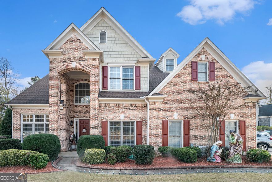 Stunning traditional south Forsyth home on a large corner lot in sought after Liberty Community. 5 Bedrooms with 4 Baths, with the option to convert the 3rd story office/playroom to a 6th Bedroom.  Enter the house through the two story covered porch with immediate access to the formal living room.  The balance of the 1st floor is an Open and Bright floorplan that highlights a large kitchen opening to the family room and separate Dining.  A main level guest suite enjoys convenient access from the garage or private back yard patio.    Upstairs, the the large primary bedroom has two closets and overlooks the backyard.  3 additonal bedrooms on this floor of which one of those includes an en suite bathroom.  Access the 3rd story bonus room is from this level and could be an office, playroom or a 6th bedroom with little modification.    Enjoy the large level driveway and yard which is conveniently located directly across the street from Clubhouse Amenities: Gym, Clubhouse, Jr Olympic pool, kids fountain, playground, tennis, pickleball, and basketball courts!  Home recently painted on the outside.  New Roof in 2019.  Upgraded and replaced HVAC.    Close to Blue Ribbon award-winning schools, GA - 400, restaurants, Big Creek Greenway, Northside Hospital, and the new Cumming City Center. All of this is very convenient when you choose South Forsyth County!