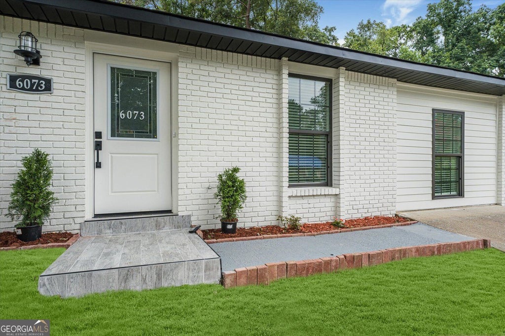 Photo of 6073 Fieldcrest Drive, Morrow, GA 30260 (MLS # 10848549)