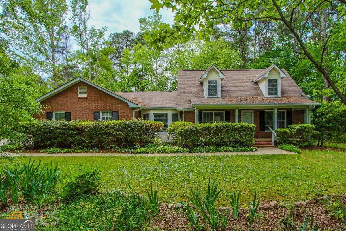 Beautiful Peaceful Country-like Setting located Close To Trilith, Fayette Pavilion and Top Fayette County Schools * This 4 Sided Brick Home has a Large Family Room and Formal Dining Room w/ Hardwood Floors and Masonry Fireplace * Kitchen with Granite Counters * Dishwasher and Stove included* Large Breakfast Nook with Large Windows overlooking the private backyard * Spacious Laundry Room just off the Breakfast Nook * Primary On the Main With Walk In Closet * Primary Bath Has Jacuzzi Tub, Separate Shower and Tile Floors * Half Bath On Main * Upstairs has 2 Large Bedrooms and Jack-n-Jill Bath * Dual Zoned with 2 HVAC Units * All Appliances remain including Washer, Dryer and Refrigerator * Side entrance to spacious 2-Car Garage * Enjoy this Gorgeous Backyard for gatherings and cookouts * Pets ok depending on breed and size *