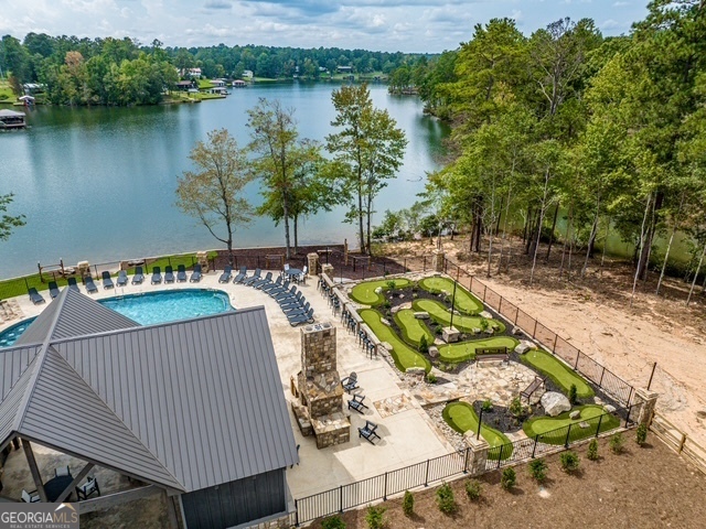 Build Your Dream Home in The Falls at Rocky Creek - Gated Lake Access Community with Resort-Style Amenities Discover the perfect place to create your custom home in The Falls at Rocky Creek, one of Lake Sinclair's most desirable new gated communities. This off-water lot offers a peaceful, scenic setting with access to exclusive lake amenities and a lifestyle that feels like a getaway every day. Community Highlights: Lake access with private boat ramp, boat slips, and a community dock Gated entrance for privacy and peace of mind Lakefront park & pavilion - ideal for cookouts, sunsets, and gathering with neighbors Resort-style pool with cozy outdoor fireplace Mini golf course and outdoor fitness area for year-round fun Beautiful surroundings with upscale homes and a thoughtfully designed layout Located just under 30 minutes to downtown Milledgeville, you'll enjoy quick access to top dining, shopping, and entertainment while coming home to a tranquil lakeside escape. Whether you're ready to build now or invest in your future, this lot is a rare opportunity to be part of a growing, vibrant lake community. Secure your spot in The Falls at Rocky Creek today!
