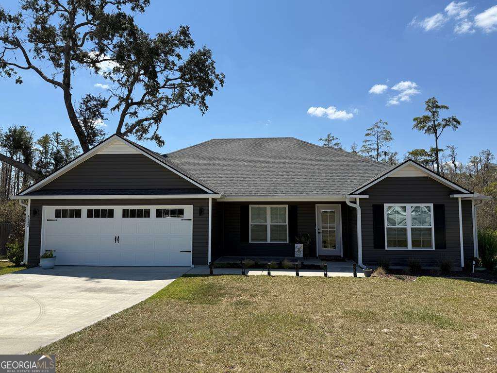 Beautifully kept 4 bedroom home in a quiet subdivision with no back neighbors for extra space and peace. The open floor plan welcomes you with a great room featuring a tray ceiling and gorgeous accent wall. The kitchen is the heart of the home with stainless appliances-including the refrigerator, and a window overlooking the backyard for more natural light. The owner's suite offers a tray ceiling, dual closets including a huge walk-in, and a private bath with dual sinks and stand-alone shower. Split floor plan keeps the master tucked away from the secondary bedrooms. Storage is abundant throughout! Enjoy mornings and evenings on the welcoming screened porch overlooking a large backyard, perfect for kids, pets, or a garden. With its inviting design, thoughtful details, and well-cared-for condition, this home is waiting for you to call it yours!