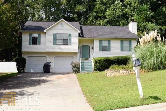 WONDERFUL 3+ BED HOME. STEP UP VALUTED GREAT ROOM WITH NEWER LAMINATED FLOORING. DINING AREA OFF KITCHEN. KITCHEN WITH ISLAND AND ALL BLACK APPLIANCE PACKAGE. SUNROOM OFF KITCHEN OVERLOOKS LARGE FENCED LEVEL LOT WITH PAVER WALKWAY. FRESHLY PAINTED INSIDE AND OUT. MASTER BED WITH PRIVATE BATH AND GARDEN TUB. LOWER LEVEL FEATURES ADDITIONAL POSSIBLE 4TH BEDROOM AND ADDITIONAL FINISHED AREA. COULD BE KIDS PLAYROOM, WORKROOM, ETC. THE POSSIBILITIES ARE ENDLESS. 2 CAR ATTACHED GARAGE. HOMES SHOWS GREAT. YOU WONT BE DISAPPOINTED.