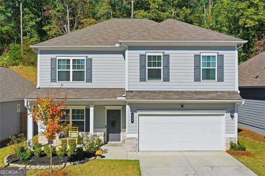 Spacious 4-bedroom, 2.5-bath, tucked away on a premium cul-de-sac lot of Worley Preserve. The front porch welcomes you into an open foyer and dining room. There's a convenient powder room for guests, and the open kitchen flows into an informal dining area that connects to the family room featuring a modern black fireplace with gas logs. A pristine white kitchen with granite countertops, new dishwasher, new microwave, corner pantry, and upgraded lighting above the island with bar seating. Upstairs, the layout separates everyday life, with all bedrooms anchored around a flex space, ideal for a play area. The primary suite features an oversized closet, dual vanity, seamless glass shower, and a separate water closet. The three additional bedrooms have been enhanced with a wood batten and board accent wall, lending each room its own unique design and character. Each secondary bedroom features a walk-in closet. The secondary bathroom includes a vanity with a seating area for added convenience. For practicality, the laundry room is located upstairs. The fully fenced backyard is private and features an open-air patio, with plenty of yard space for playtime. Based on the development's land in this interior cul-de-sac, there are a limited number of homes, which creates additional parking and play areas when entertaining guests. HOA dues cover lawn maintenance, and homeowners are welcome to plant their own flowers. Seller upgraded many standard features while under construction, in addition to the entire home having professional blind installation. Located near the county line, this location is perfect for those seeking the conveniences of Ball Ground, Canton, or Jasper.