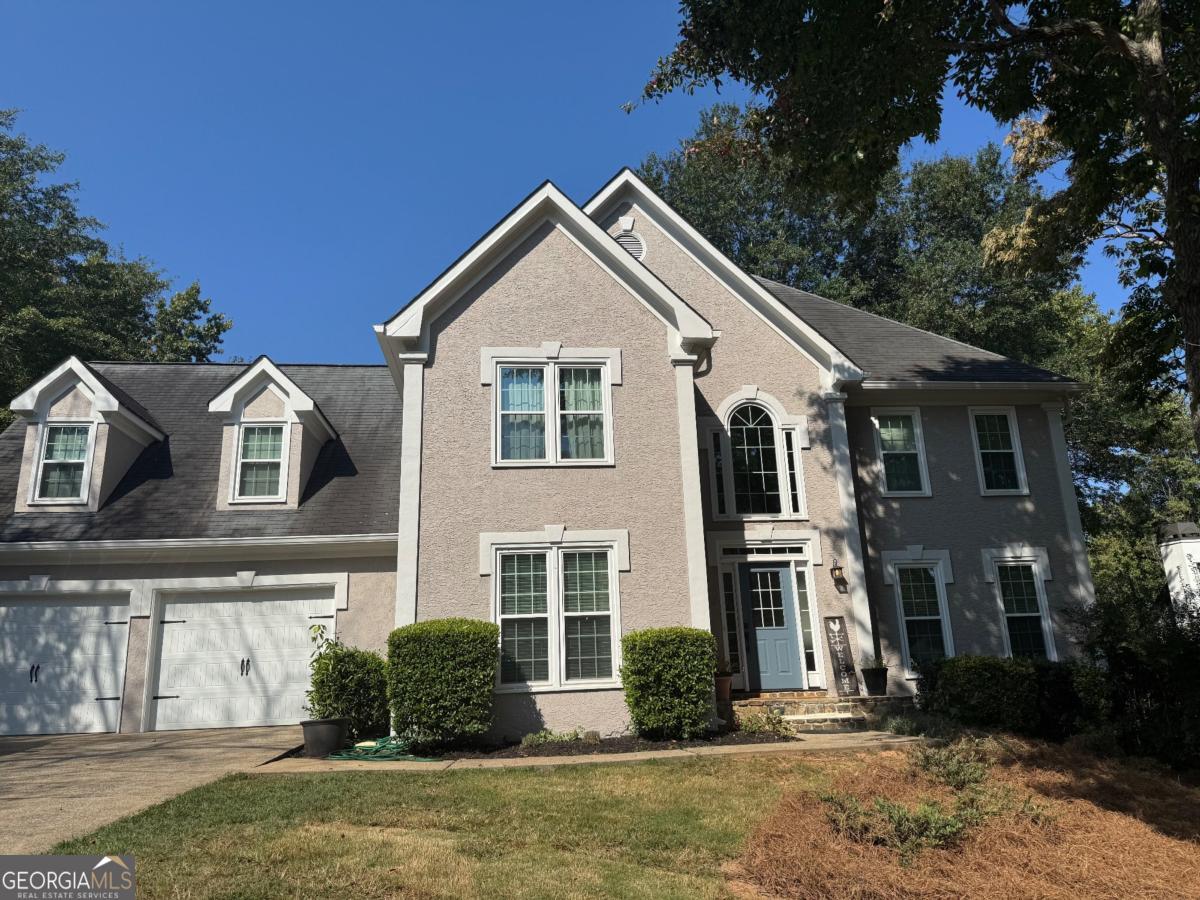 Beautiful East Cobb home in desirable Summerford! All top rated and award winning schools. Lovely and spacious open floorplan with lots of natural light streaming in on all sides. Gleaming hardwood floors on the main, fireplace with built-in bookshelves and cabinetry. Inviting 2-story foyer. New double pane windows throughout. Newly painted Hardcoat Stucco and Hardiplank siding. Huge deck just outside the family room overlooking the gorgeous private backyard. Luxurious kitchen open to the family room with granite and backsplash, solid oak cabinets and nice breakfast bar. Fabulous primary suite w/ lots of closet space, lovely bathroom with frameless glass shower, upgraded fixtures, and a jetted tub. All secondary bedrooms are extra spacious and have walk-in closets. Great setup with 3 full baths upstairs. Huge secondary bedroom with it's own bathroom makes for a comfortable and private 2nd master or guest room. Wonderfully finished and daylight basement with a full bathroom, multiple large living spaces, and tons of storage. Could easily be set up for an in-law suite. Check out the new large lower level deck and patio overlooking the private backyard. Quiet and level cul-de-sac lot in a wonderful & very active subdivision with pool, tennis, clubhouse and Gazebo.This is the ultimate location with a short jaunt to Shopping, Restaurants, Sandy Plains Baseball fields, Sweat Mountain Park and all its features of baseball, tennis, picnic shelter, play ground & awesome Dog Park. Cobb County's award winning schools, and a plethora of sporting activities, running & biking trails. EZ commute with I-75, GA 400 & I-285.