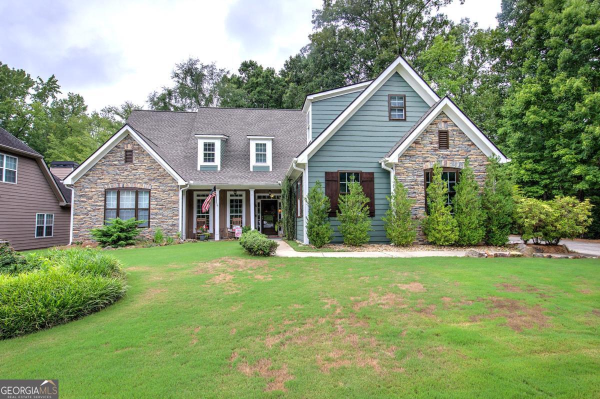 This is THE ONE!!! Hard to find step less ranch. The largest ranch floor plan offered in the Sedgefield Community on one of the largest lots! This 3 bedroom 2 bath home sits on a little over an acre of land with excellent privacy and fenced in backyard. An entertainers delight with open floor plan, eat - in kitchen, keeping room, spacious family room and sunroom. Hardwood floors throughout the entire main living space. Kitchen includes granite countertops, tile backsplash, keeping room and opens to incredible sunroom, boasting natural light and views to private back yard, screened porch, large deck and outside living space/gazebo. Large master bedroom with sitting area and his/her closets. Desirable split bedroom floor plan with spacious side entry garage. Large master bathroom with tile floors and double vanity. Great outside space with gazebo and fireplace allows for the perfect outside spot to listen to the creek or host a BBQ. Huge floored attic for storage as well. COMMUNITY POOL. Close to shopping, schools and entertainment. Don't miss out on this one!!