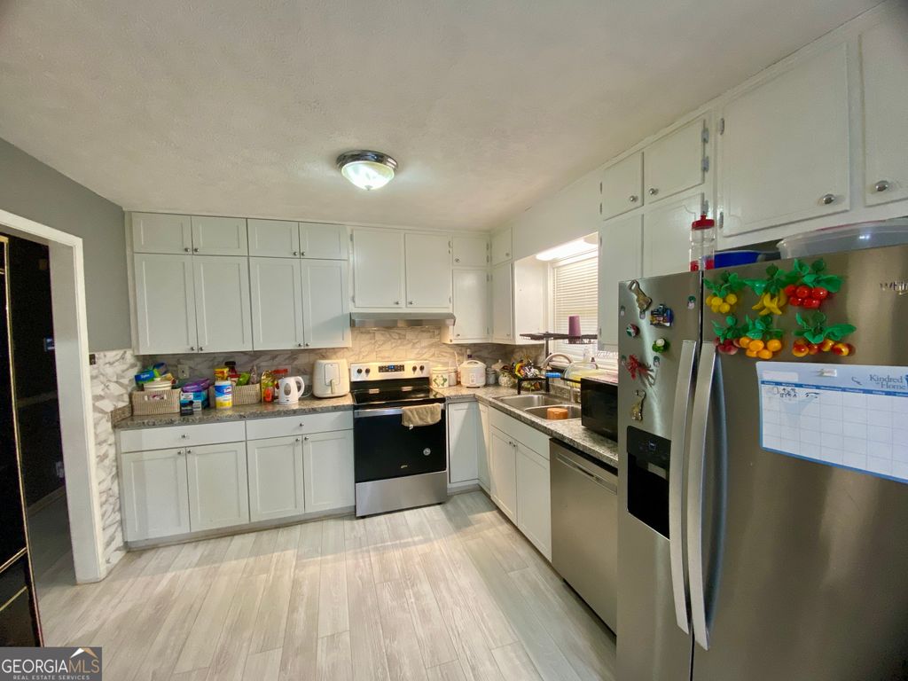 Photo of 6907 Stephens Dr, Rex, GA 30273 (MLS # 10689931)