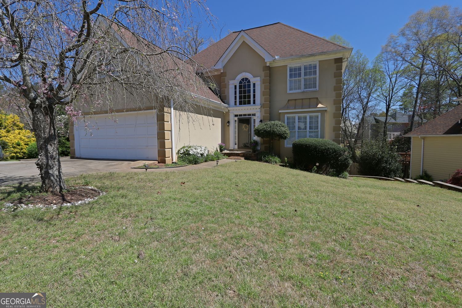 Nestled in a well-established swim and tennis community within the highly sought-after Lanier High School district, still recognized in 2025 for its excellent academics and vibrant programs. The open-concept layout features hardwood floors, a spacious kitchen with granite countertops and stainless-steel appliances, a vaulted eat-in area, and a screened sun porch overlooking a large, private lot. The luxurious master suite boasts a spa-like bath with quartz countertops, and the finished basement offers additional living space with a bedroom and bath, perfect for guests or a home office. Located just minutes from the shopping and dining of Suwanee and Sugar Hill, this home offers modern comfort, top-rated schools, and access to outstanding community amenities in one of the area's most desirable neighborhoods.