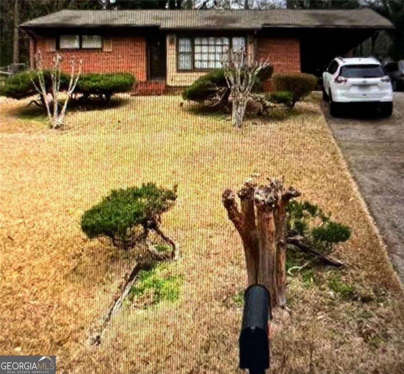 Welcome to your dream home in the heart of Decatur! This stunning all-brick ranch-style single-family home offers the perfect blend of classic charm and modern amenities. Property Highlights: Location: Decatur, GA 30032 Bedrooms: 3 spacious bedrooms Bathrooms: 1.5 bathrooms Living Space: Generous open floor plan with abundant natural light Kitchen: Modern new kitchen , with new countertops, and ample cabinet space Flooring: Beautiful Laminate floors throughout Yard: Large, private backyard perfect for entertaining or relaxing Parking: Attached Carport with additional driveway parking Extras: cozy den, updated fixtures, and fresh paint throughout Additional Features: Proximity to top-rated schools, parks, and shopping centers Easy access to major highways and public transportation Quiet, friendly neighborhood with a strong sense of community This home is a must-see! Whether you're a first-time homebuyer or looking to downsize, this charming ranch offers everything you need and more. Schedule a showing today and make this Decatur gem your own!