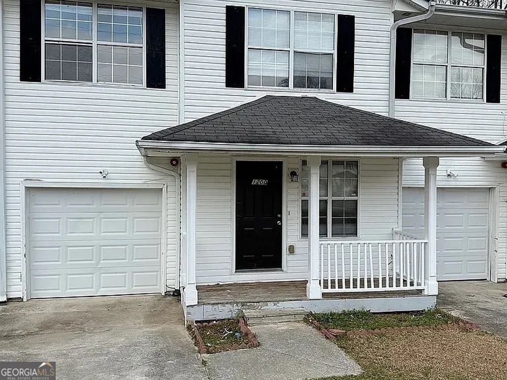 Photo of 1202 Pinedale Circle NW, Conyers, GA 30012 (MLS # 10685138)