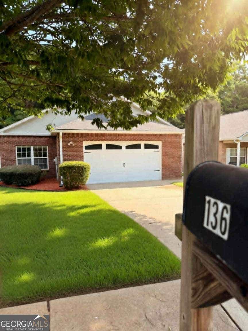 Photo of 136 Astilbe Meadow Drive, Locust Grove, GA 30248 (MLS # 10791144)