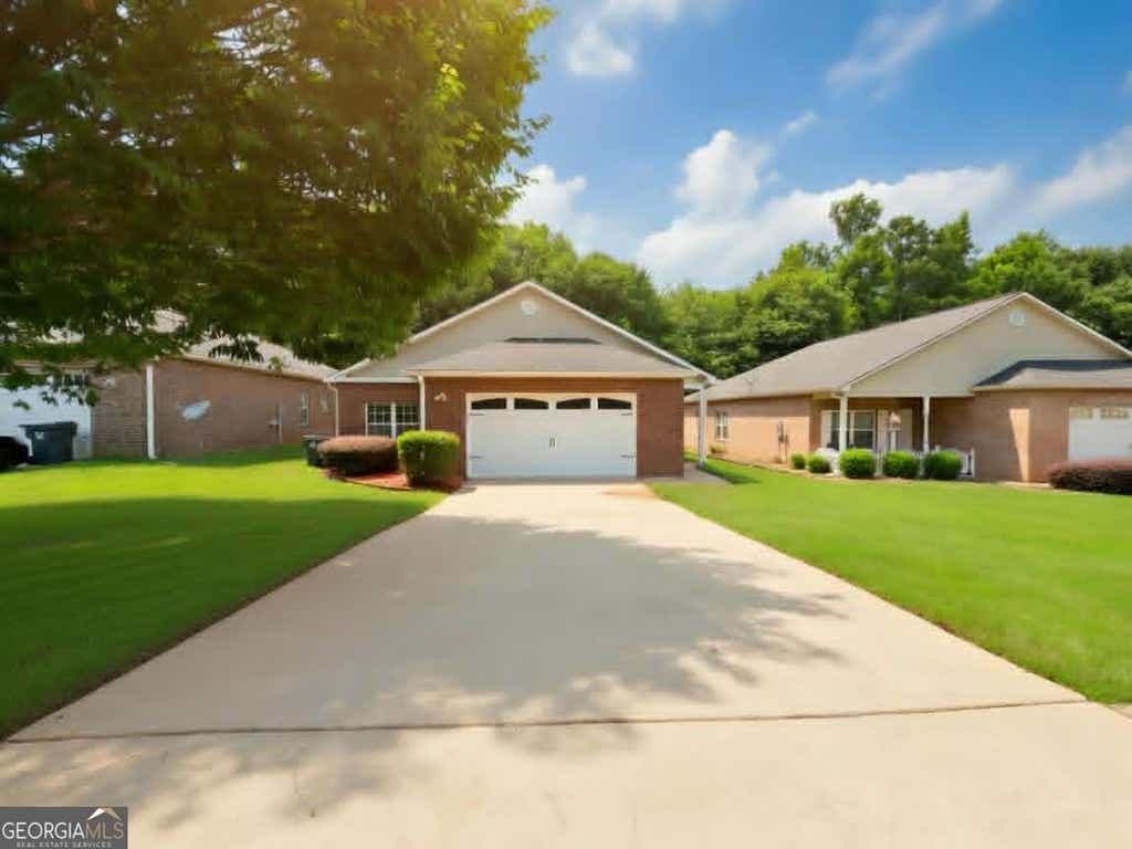 Photo of 136 Astilbe Meadow Drive, Locust Grove, GA 30248 (MLS # 10791144)