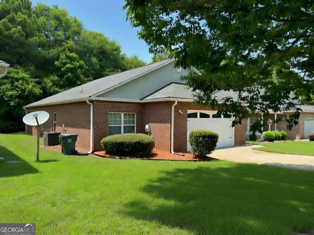 Photo of 136 Astilbe Meadow Drive, Locust Grove, GA 30248 (MLS # 10791144)