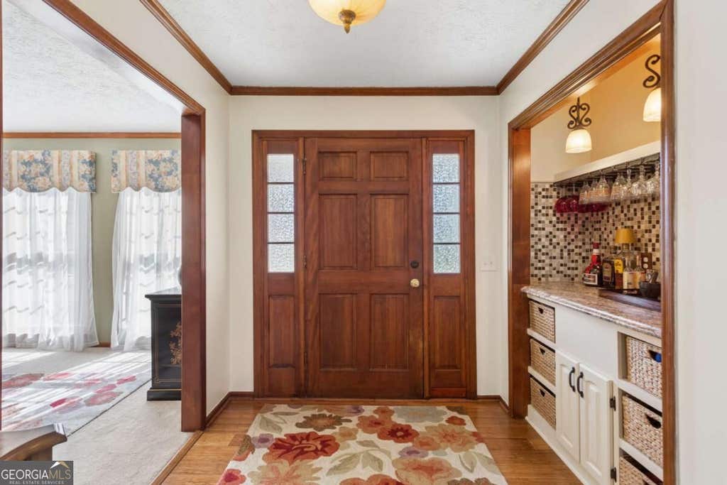 Photo of 6876 Kingsboro Drive, Lithia Springs, GA 30122 (MLS # 10830428)