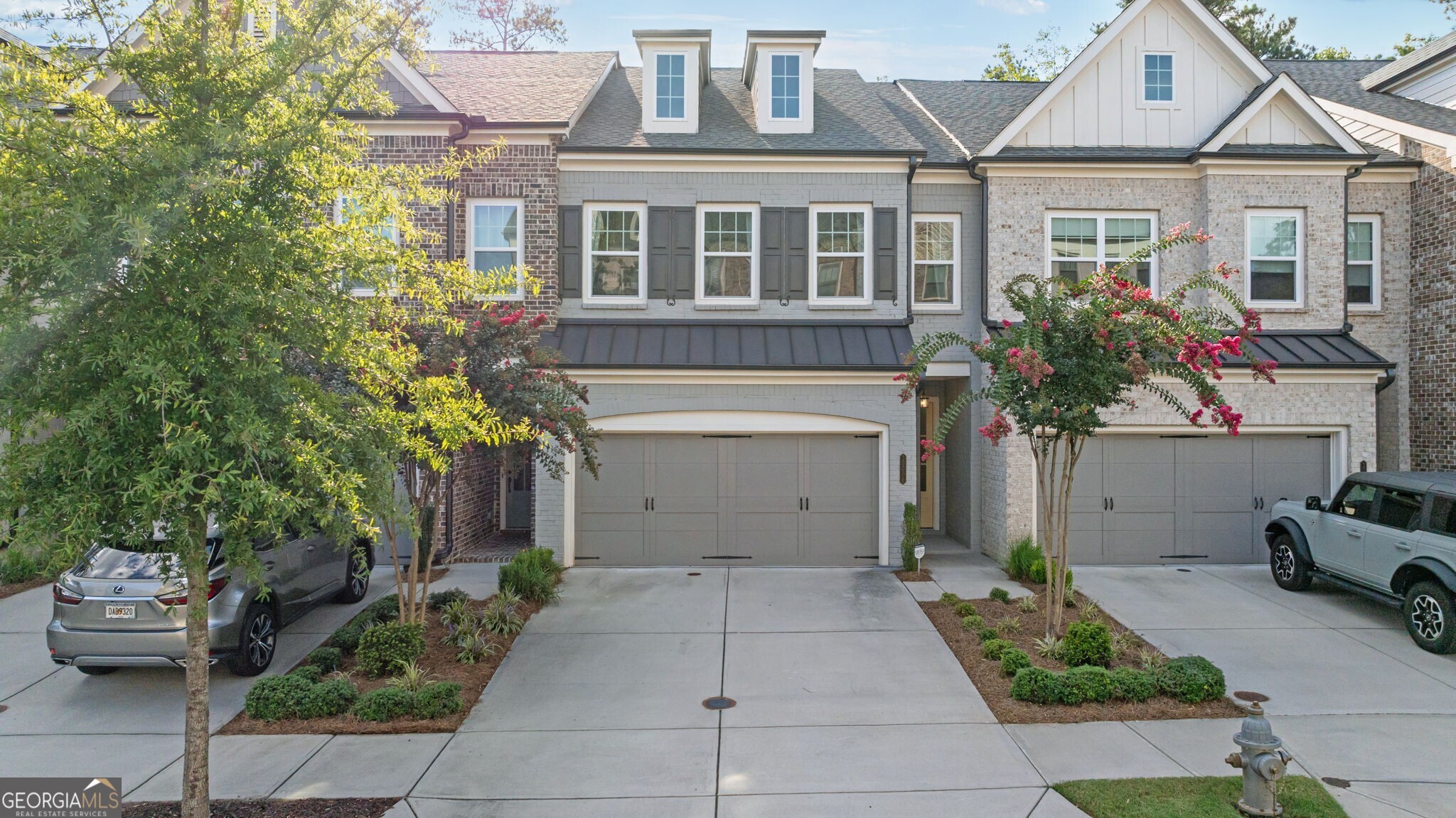 Glamorous townhome in sought after Harlow West. The gated community of Harlow West offers resort-style amenities featuring a clubhouse, two pools with cabanas, tennis & pickleball courts, dog park, green spaces and walking trails. This 3 bed 2.5 bath home boasts tons of natural light, open floor plan and easy low maintenance living. Gourmet kitchen with oversized quartz island, SS appliances, gas cooktop and dry bar. Kitchen overlooks spacious living room with views to the beautifully manicured private fenced backyard. Upper level oversized primary suite. Spa like primary bath includes dual sinks, soaking tub, frameless glass shower and walk in closet. 2 secondary bedrooms and full bath. Just minutes to Downtown Roswell, Downtown Alpharetta, Avalon, GA-400 and within walking distance to Ameris Bank Amphitheatre. This immaculately maintained home is turnkey and ready for the most meticulous buyer.