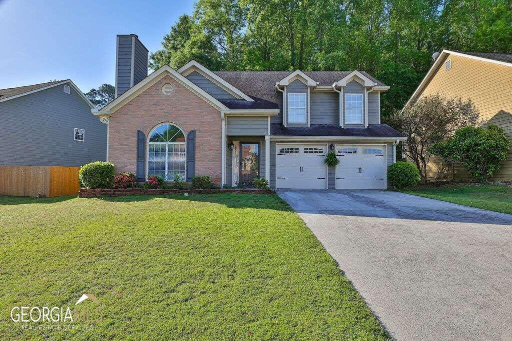 Here is your chance to own a great home in beautiful Lawrenceville. Home has been lovingly taken care of. Kitchen has been updated with granite countertops and tile backsplash. New floors throughout the whole house LVP on main and new carpet upstairs. Backyard is completely fenced and has great patio area. There is no HOA as well.