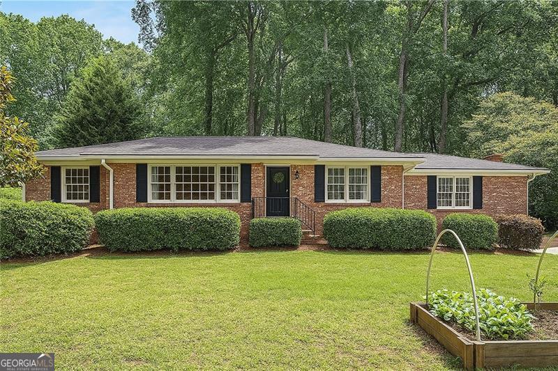 Beautiful updated home in desirable Brookhaven neighborhood under 700K! Located in desirable Montgomery Elementary district! One level living in this lovely brick ranch home with private fully fenced backyard oasis with additional storage and large level patio perfect for entertaining. Large, .7 acre lot offers plenty of space in both the back and front yard with plenty of privacy from the main road. Gleaming hardwood through most of the home with tile in the spacious, fireside den. Renovated kitchen boasts white cabinets, stainless appliances, beverage cooler and granite countertop. Generous primary bedroom has built-in wardrobes and an en-suite bath with shower. Two guest bedrooms share a hall bath with tub/shower combination. The front entrance rooms offer flexibility in use from a home office space or children's play room and are filled with a peaceful array of natural light. The possibilities are endless! The convenient location provides quick access to 285, 85 and 400, as well as Perimeter, the heart of Brookhaven and Buckhead. R-30 insulation installed for efficiency approximately 7 years ago. This GEM is not to be missed for your opportunity to own in the desirable and growing community of Brookhaven where equity and home values are increasing every year. Brand new HVAC installed in 2025. New ceiling fans installed in all 3 bedrooms and in laundry room in 2023 Replaced water line (from street to home) in 2024 New kitchen faucet installed in 2024 May / June 2025 - new HVAC installed Powerwash of gutters, driveway, walkways and shed Air ducts and vents cleaned and deodorized.