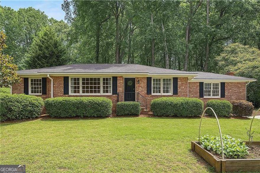 Beautiful updated home in desirable Brookhaven neighborhood under 700K! Located in desirable Montgomery Elementary district! One level living in this lovely brick ranch home with private fully fenced backyard oasis with additional storage and large level patio perfect for entertaining. Large, .7 acre lot offers plenty of space in both the back and front yard with plenty of privacy from the main road. Gleaming hardwood through most of the home with tile in the spacious, fireside den. Renovated kitchen boasts white cabinets, stainless appliances, beverage cooler and granite countertop. Generous primary bedroom has built-in wardrobes and an en-suite bath with shower. Two guest bedrooms share a hall bath with tub/shower combination. The front entrance rooms offer flexibility in use from a home office space or children's play room and are filled with a peaceful array of natural light. The possibilities are endless! The convenient location provides quick access to 285, 85 and 400, as well as Perimeter, the heart of Brookhaven and Buckhead. R-30 insulation installed for efficiency approximately 7 years ago. This GEM is not to be missed for your opportunity to own in the desirable and growing community of Brookhaven where equity and home values are increasing every year. Brand new HVAC installed in 2025. New ceiling fans installed in all 3 bedrooms and in laundry room in 2023  Replaced water line (from street to home) in 2024  New kitchen faucet installed in 2024    May / June 2025 - new HVAC installed  Powerwash of gutters, driveway, walkways and shed  Air ducts and vents cleaned and deodorized.