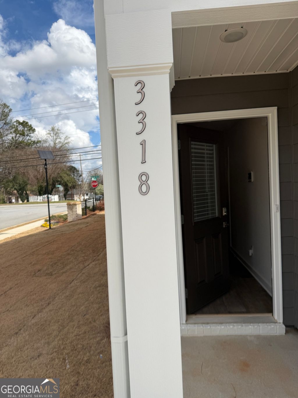 Photo of 3318 Stonewall Lane, Atlanta, GA 30349 (MLS # 10705614)