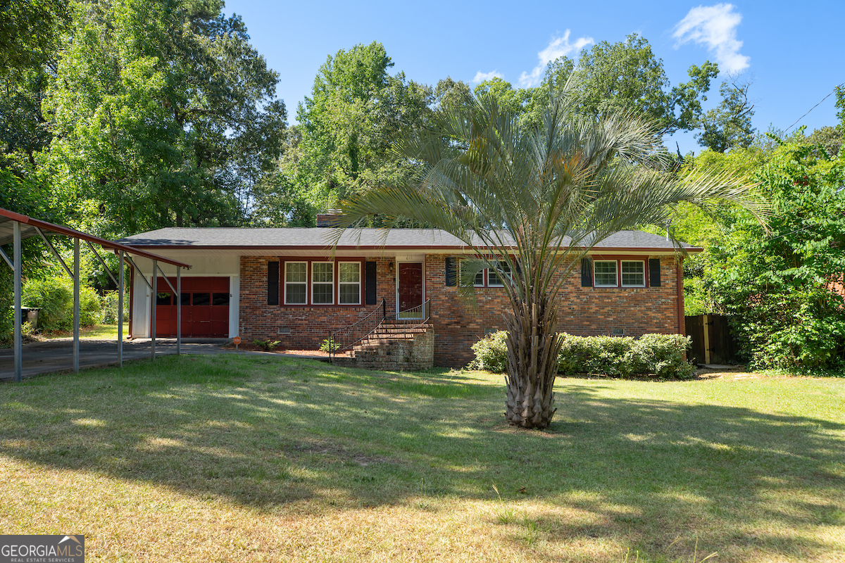 SUMMER HEAT GOT YOU BEAT??? COME CHECK OUT THIS FABULOUS HOME AND INGROUND POOL!!! Fantastic three-bedroom two-bath and a half bath brick home, with a BACKYARD MADE FOR ENTERTAINING! Upon entering the home you are welcomed into the bright and airy family room with a fireplace -a large library  with built-ins. At the heart of the home you will find a LARGE COUNTRY KITCHEN BOASTING LOTS OF CABINETS AND MORE BUILT-INS!!! One side of the home has two spacious guest bedrooms and a full bath, half bath. While the other side of the home is designated for the large master suite, en-suite with custom shower, large walk-in closet, and bonus room/office/storage. Enjoy your days sitting on the patio or cool off in the pool. Like to entertain?? Check out the Gazebo and fire pit area, plenty of space to put a TV for those college football days! Don't forget to take a look at the workshop, complete with electricity and additional storage. Call your favorite realtor today to schedule your tour!!