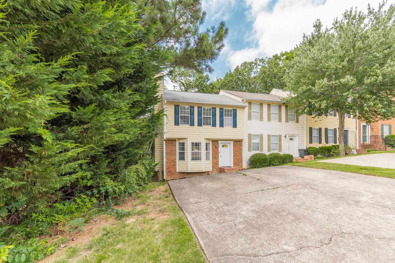 Come see this move in ready 3 bedroom, 2.5 bathroom town home right in East Cobb! Kitchen includes white cabinets and granite countertops. Family room also comes with a gas log fireplace. There's new flooring, a renovated master bath, and fresh paint throughout. The finished basement is perfect for an entertainment space! It's in a great neighborhood with good schools. This property is located close to shops, restaurants, and YMCA. Welcome home!