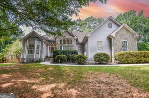 Photo of 223 Windsong Lane SW, Lilburn, GA 30047 (MLS # 10592302)