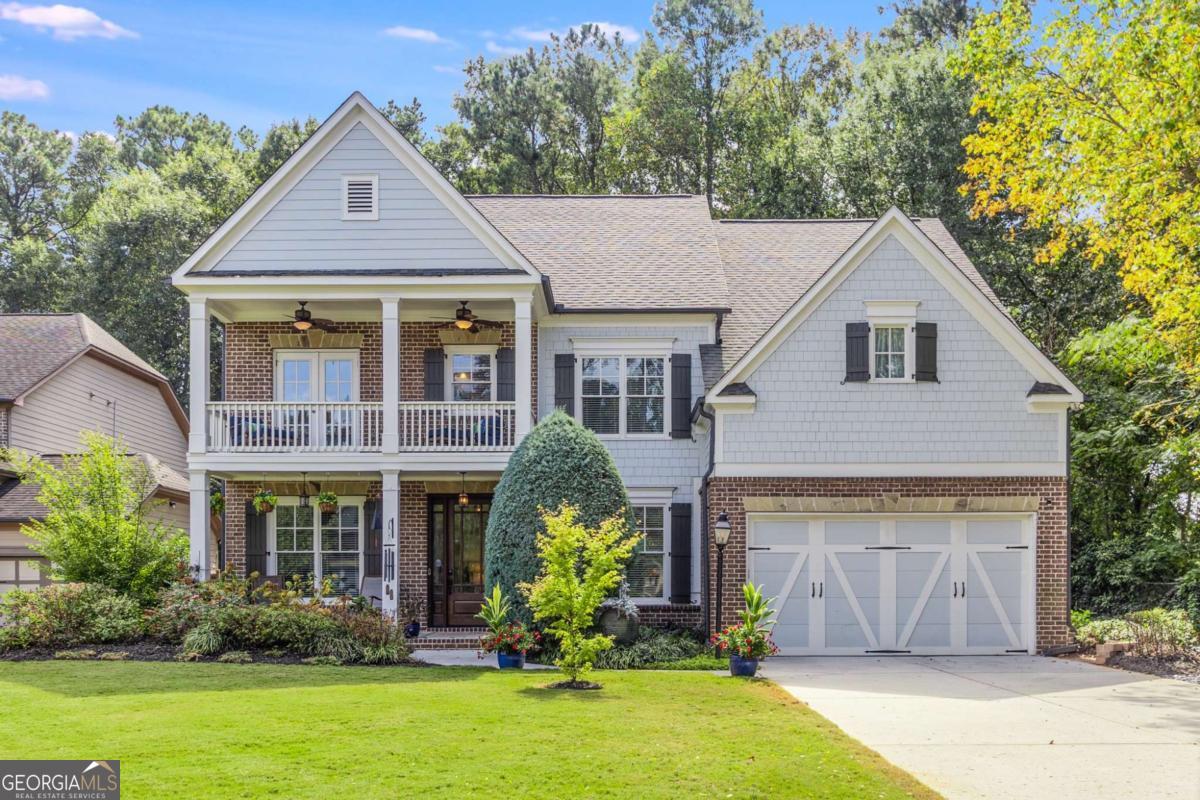 Oozing with curb appeal and surrounded by mature landscaping, this 5-bedroom, 4 bath Traditional home on a serene cul-de-sac is a must-see! This Midway Woods charmer combines comfort and sophistication in a thoughtfully designed floorplan. The main level features a guest suite, a designated office, and a formal dining room, leading to an expansive great room. The heart of the home, the chef's kitchen, was beautifully updated in 2022 with stunning top tier granite countertops, chic backsplash, and cool-toned cabinets offering ample storage, and informal eat-in dining. The massive kitchen island with countertop seating seamlessly flows into the inviting living room, highlighted by a gas-burning fireplace and custom bookshelves, creating a warm atmosphere for gatherings. Sunlight floods the space through window-lined walls, leading to a private patio and lush, fully fenced backyard-an ideal oasis for unwinding, grilling, or entertaining amidst natural surroundings. Ascend the newly updated staircase to discover a cozy loft, perfect for a game room or teen hangout. The upper level boasts 4 bedrooms and 3 bathrooms, consisting of 3 secondary bedrooms - 1 with a private en-suite and balcony and 2 with an adjoining bath. The massive owner's retreat features high ceilings and a private sitting room overlooking your green escape, while the luxury en-suite bath, renovated in 2022, feels like a spa retreat boasting a stylish glass-enclosed shower, large soaking tub, double vanity with top-tier granite and a huge dressing room custom closet! Additional highlights include new wood flooring throughout, fresh paint, a renovated primary bath, updated kitchen, a new hot water heater (2023), and a mini-split system in the 2-car garage for added comfort. Located in a quiet cul-de-sac, you'll enjoy the charm of Decatur just around the corner, with restaurants, shopping, festivals, and more at your fingertips. Plus, with easy highway access, you're only a short drive from all that Atlanta has to offer, including the airport for work trips or weekend getaways! Don't miss the chance to make this exquisite home your own! **Tuition program for City Schools of Decatur is available - Current tuition is $7883 per year (subject to change for 2026)**