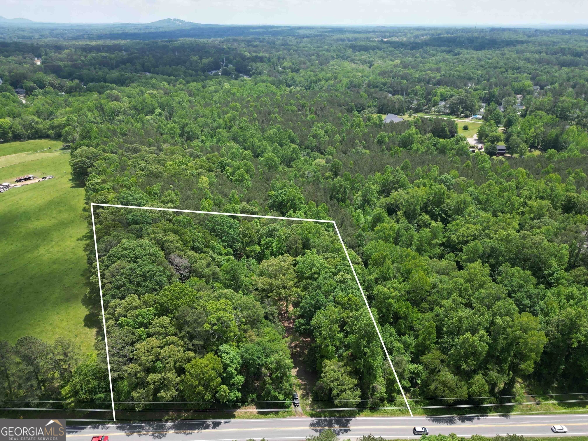 TWO PRIME RESIDENTIAL TRACTS NOW AVAILABLE IN EAST PAULDING!!! This listing is for BOTH Tracts 1 (1.111 acres) and Tract 2 (1.100 acres) -- see recorded plat in documents. Each lot offers a rare opportunity to build in a fast-growing corridor with NO HOA. Gently sloped, wooded terrain with excellent frontage on Dallas Acworth Hwy. Ideal for a custom home, builder project, or long-term investment. Located just minutes from Hwy 92, Hwy 120, I-75, Downtown Dallas, and Lake Allatoona. Enjoy nearby shopping at Costco, Publix, and Walmart, plus local dining at Rodney's BBQ. Just a short drive from dining, shopping, and more in North Paulding, Hiram, Dallas, and West Cobb! Zoned residential with public utilities nearby (buyer to verify). Soil report and recorded survey available in MLS documents. Zoned for Abney Elementary, Moses Middle, and East Paulding High.