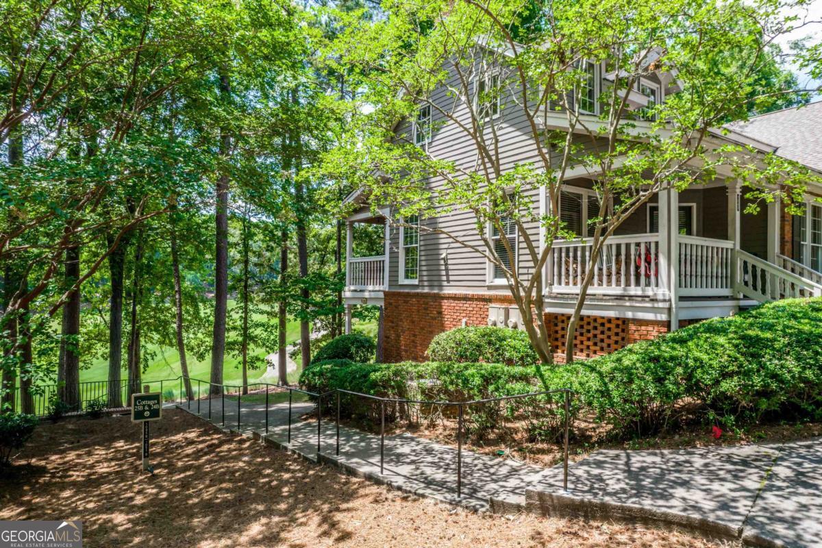 THIS 2 BEDROOM, "READY TO MOVE IN" CONDO IN REYNOLDS AT LAKE OCONEE IS IN GREAT SHAPE, WITH ALL NEW APPLIANCES AND WASHER AND DRYER, GRANITE COUNTER TOPS AND NEW WOOD FLOORING, IS CONVENIENT TO EVERYTHING AT LAKE OCONEE. IT'S ONLY A 5 MINUTE DRIVE TO PUBLIX AND LAKE OCONEE ACADEMY! Furnishings can be made available for use. It's available immediately for a 6 month or 12 month lease, or for purchase for $375,000. Please call Jennifer Hardeman at 706-817-1020