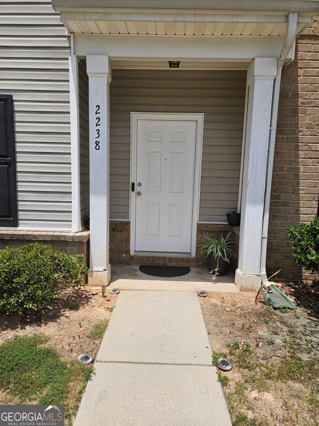 Photo of 2238 Bigwood Trail, Atlanta, GA 30349 (MLS # 10687644)