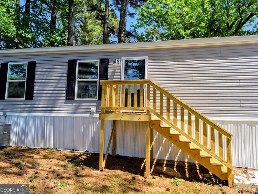 Photo of 20 Spencer Drive, Ellenwood, GA 30294 (MLS # 10871394)