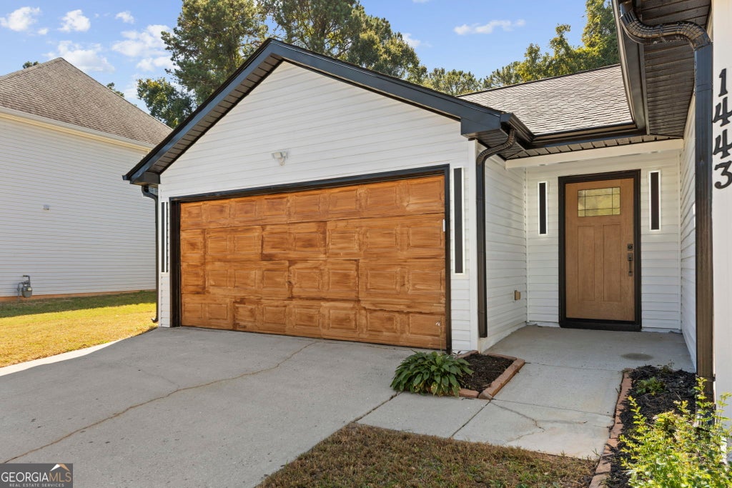 Photo of 1443 Pebble Ridge Lane, Hampton, GA 30228 (MLS # 10880362)