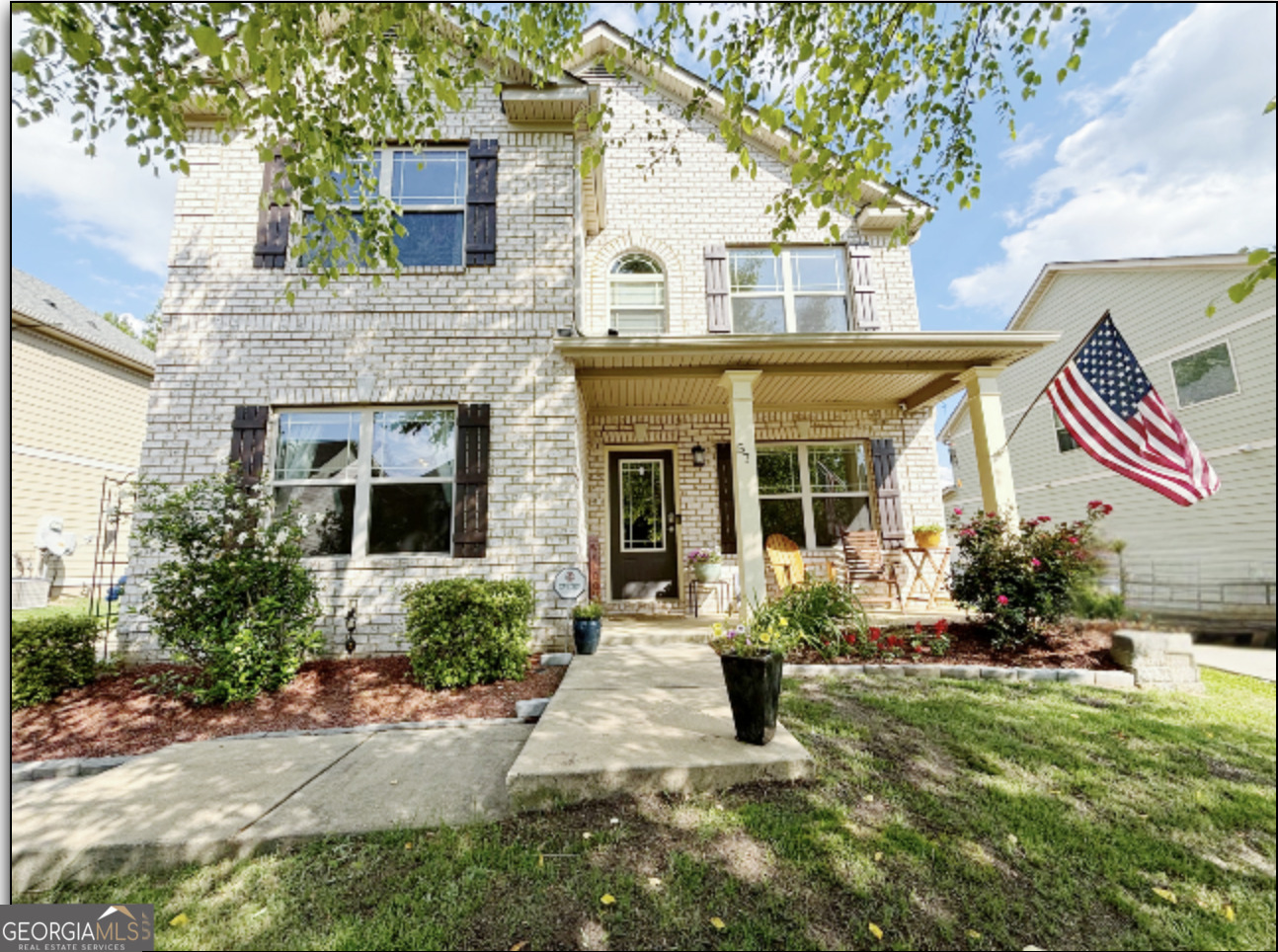 Welcome to this beautifully maintained home in a friendly and inviting neighborhood, located less than 3 miles from the heart of Downtown Newnan. The brick-front exterior is complemented by a healthy River Birch tree and carefully landscaped grounds featuring seasonal favorites like hydrangeas. Step inside to discover an open concept layout with updated LVP flooring and a cozy fireplace that adds warmth to the home. The inviting dining area flows into a large kitchen, complete with all appliances that are less than two years old which remain with the home. Upstairs, you'll find a convenient laundry room and yes, the washer and dryer are included! Each bedroom features high, vaulted ceilings, including the expansive primary suite, which highlights a recently renovated bathroom and additional walk-in closet space. With thoughtful updates and attention to detail throughout, this home offers comfort and character in every corner. Take note of the smart security systems installed both inside and outside the home, providing added peace of mind and modern convenience. This Community is Rich in culture, Character and Connection - schedule a showing today!