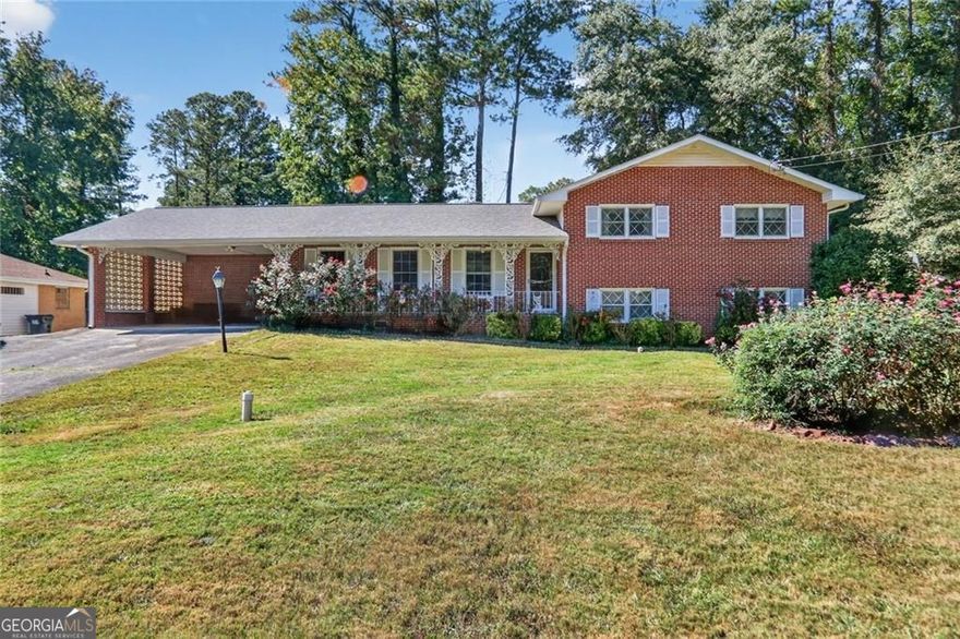 Well-built, brick split level home with all 3 levels finished and ready for move in immediately or renovate and add great value! This home offers 4 bedrooms and 3.5 baths plus large common area rooms, a spacious rec room in the basement, added sun room porch and large laundry room. Wide 2 car carport and nearly a .4 acre lot with a big backyard that is great for BBQs, entertaining or throwing the football! This home is located in an established community with great proximity to Camp Creek Pkwy, 285, 85 and the airport.