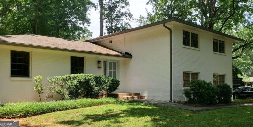 Coming Soon! Located in sought after Livsey Elem School district and the active, fun and friendly neighborhood of Lake Ivanhoe. This 4 Bedroom / 3.5 Bath split level home has so much space for entertaining, work from home, extended or growing families and all your fur kids. Hardwoods throughout the home have been refinished and new hardwoods added in the den. The kitchen has been completely renovated from top to bottom! New hardwoods installed in a beautiful herringbone pattern, new white cabinets and hardware, quartz countertops, under cabinet lighting, farmhouse sink, new SS Whirlpool appliances with a 5 burner gas range. And a slim line microwave that's vented outside! Additional cabinets for more storage under the eat in breakfast bar overlooking the den. Renovated master bath with tiled shower, tile floors, new vanity and built in cabinetry. Hall bath updated with shiplap, new toilet, vanity and lighting. Freshly painted interior and new modern painted brick exterior with a custom front door. Large laundry room and half bath conveniently located off the den. New HVAC old, Water Heater - 4 yrs, Roof - 8 yrs, security system, new plumbing, septic pumped 2025. This home sits on a large, picturesque park-like corner lot with a fenced back yard, huge patio and a storage shed for all your gardening tools! A true hidden gem close to Downtown Tucker, Heritage Golf Course, Henderson Park, and easy access to I-285, 85 and Hwy 78. Don't miss out on your dream home!