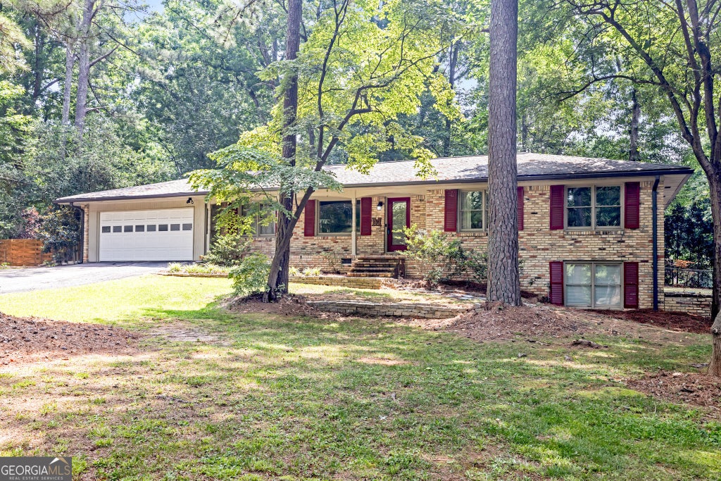 Photo of 5580 Leather Stocking Lane, Smoke Rise, GA 30087 (MLS # 10783133)