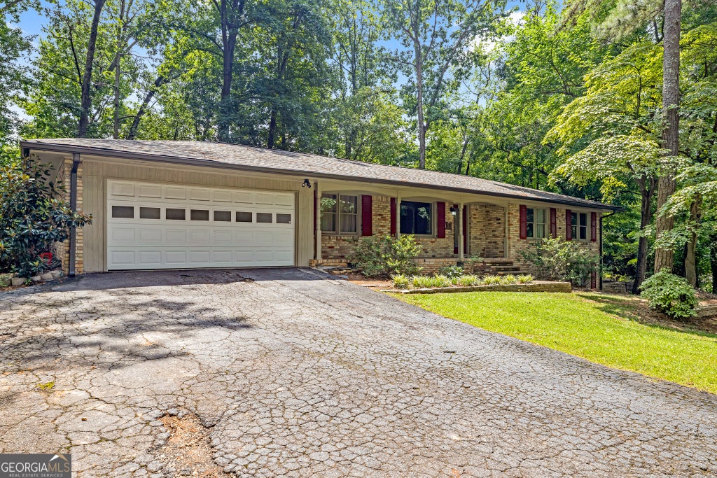 Photo of 5580 Leather Stocking Lane, Smoke Rise, GA 30087 (MLS # 10783133)